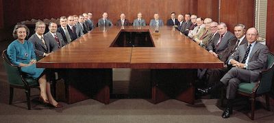 Katherine Graham, the publisher of The Washington Post, is the lone female in the boardroom.