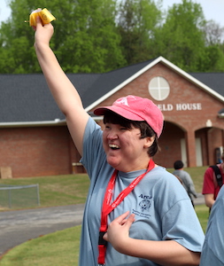 A Special Olympian expresses joy at placing in event at Area 5 games at Presbyterian College.