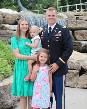 MAJ John Nimmons pictured with his wife, Shannon (’06), and their two daughters, Natalie and Caitlin.