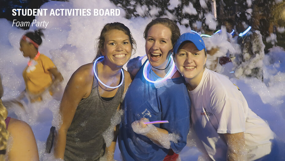 Students smiling in Foam Party