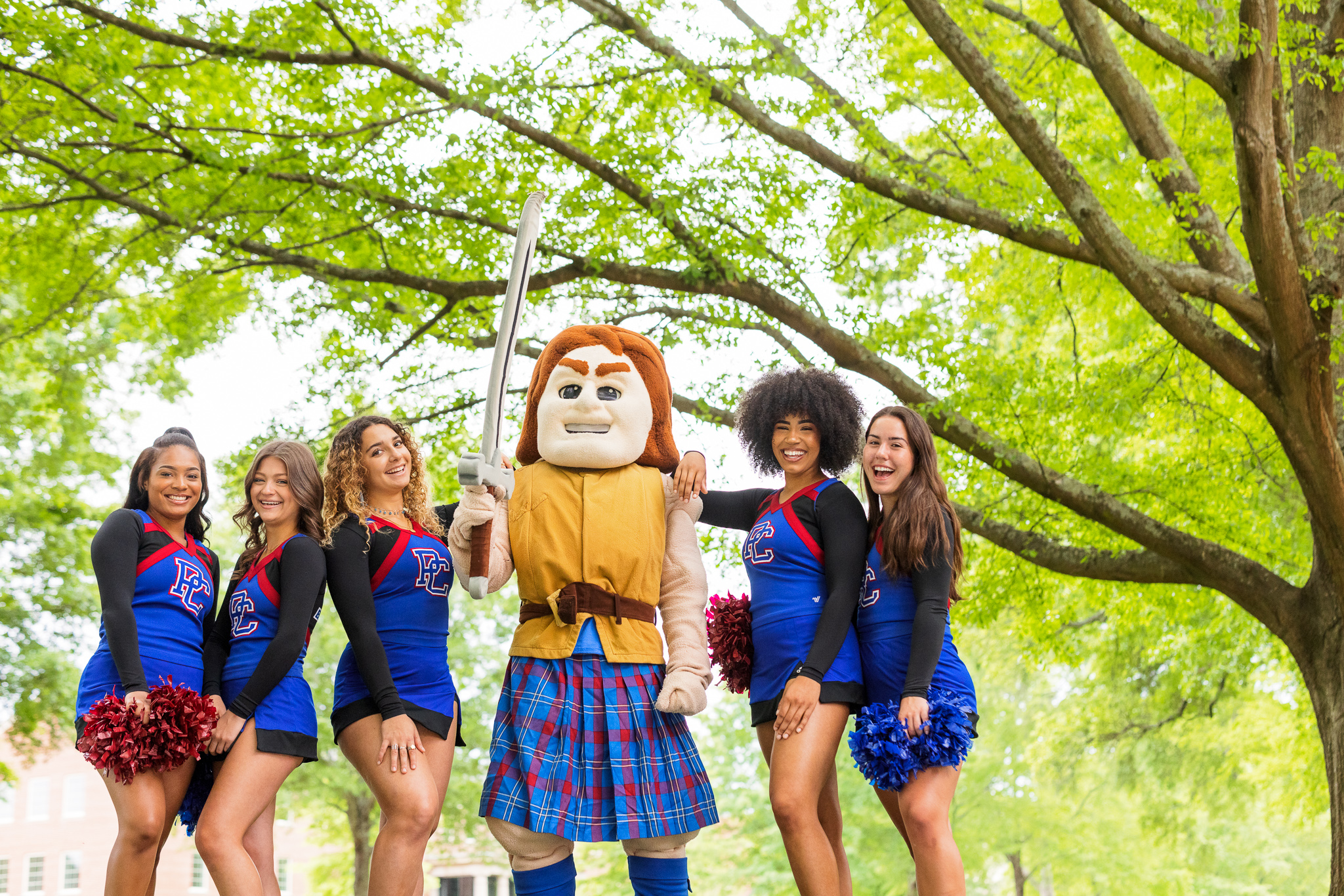 Presbyterian College cheerleading students with the PC mascot, Scotty
