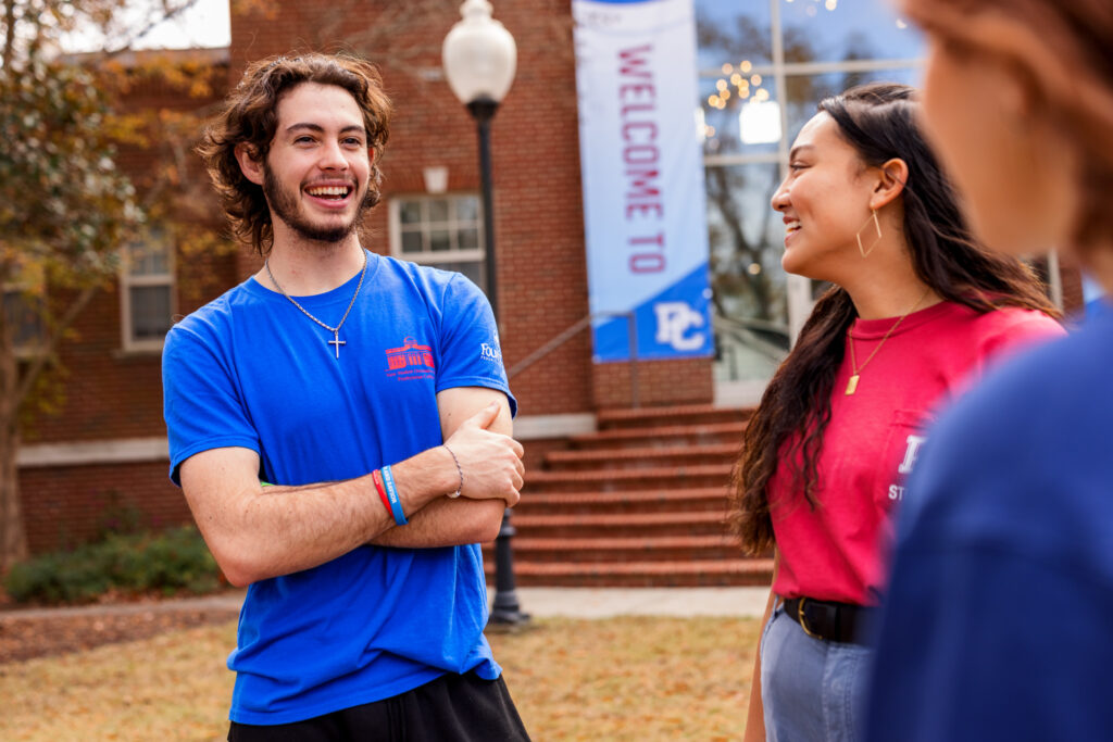 Students Gabe Butler and Vanessa Palisin talking at Presbyterian College