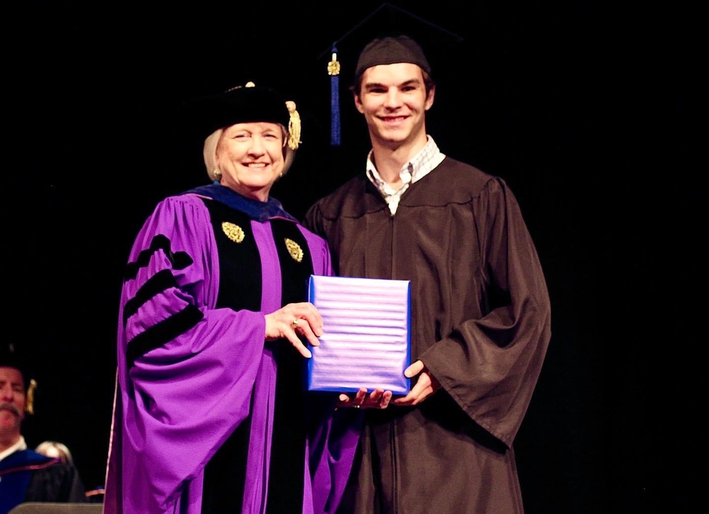 Outstanding Senior William Patrick Johnson of Lexington with Presbyterian College president Dr. Anita Gustafson