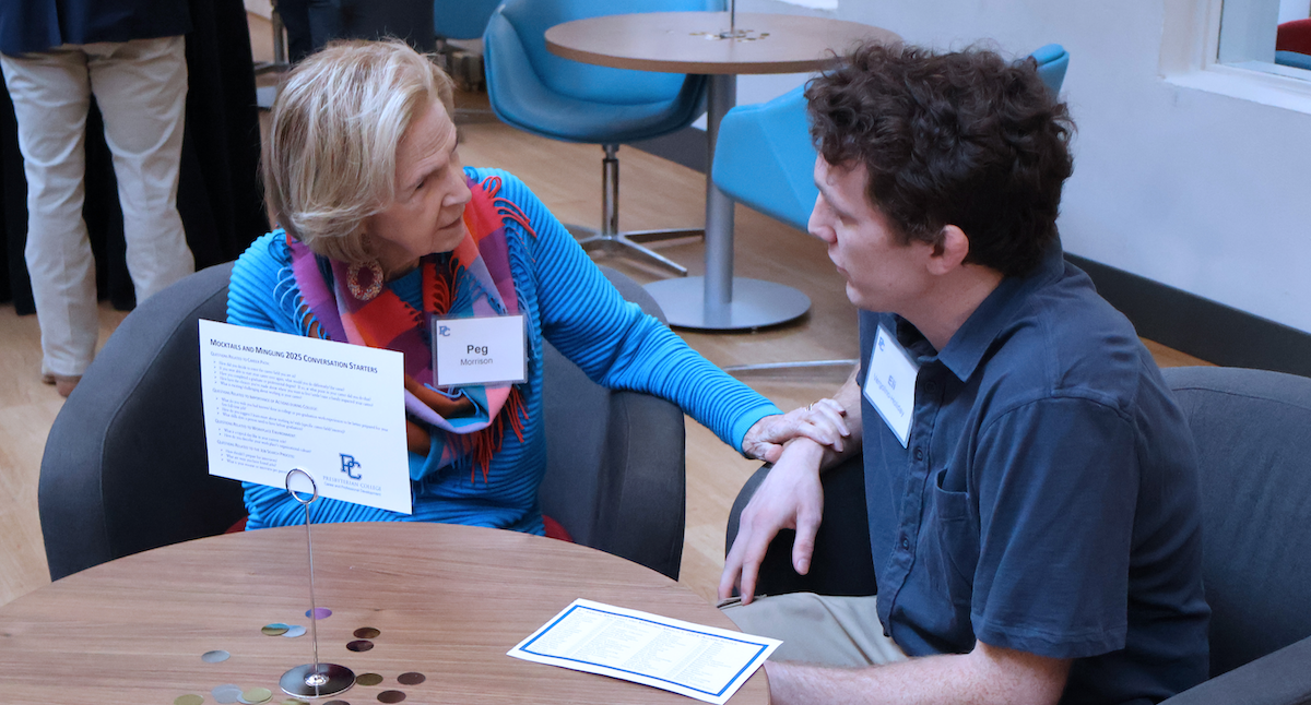 A Presbyterian College student (right) converses with a PC alumna during the college's ninth annual Mocktails and Mingling event hosted by the Office of Career and Professional Development.