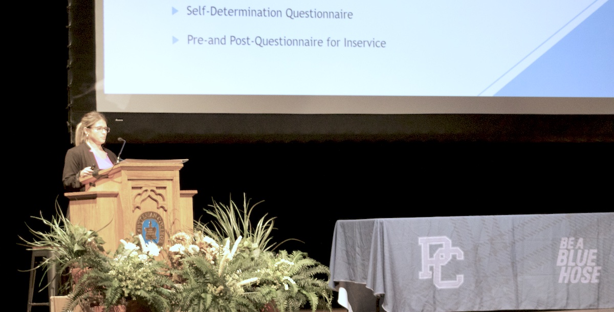 Occupational Therapy capstone presentation in Belk Auditorium.