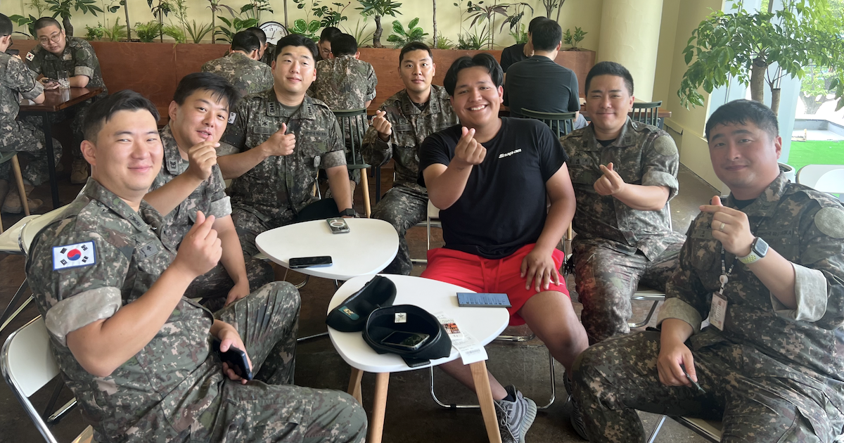 Presbyterian College sophomore Charlie Villeda-Nube with members of the South Korean Army.