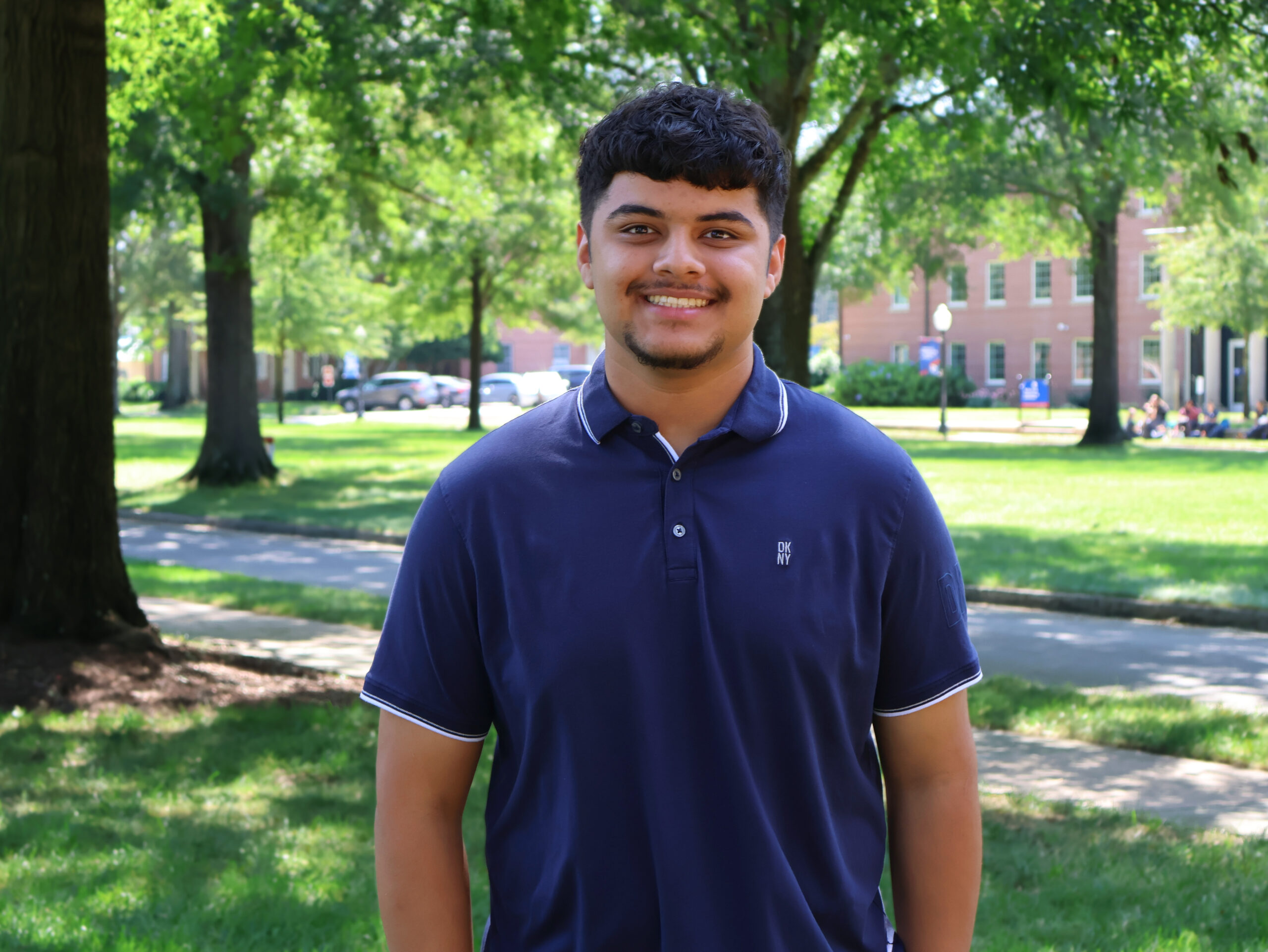 Presbyterian College student Alex Melgar poses for a picture on campus.