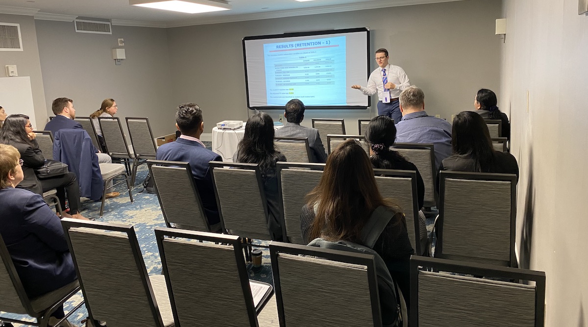 Seth Cooper presenting his research in class