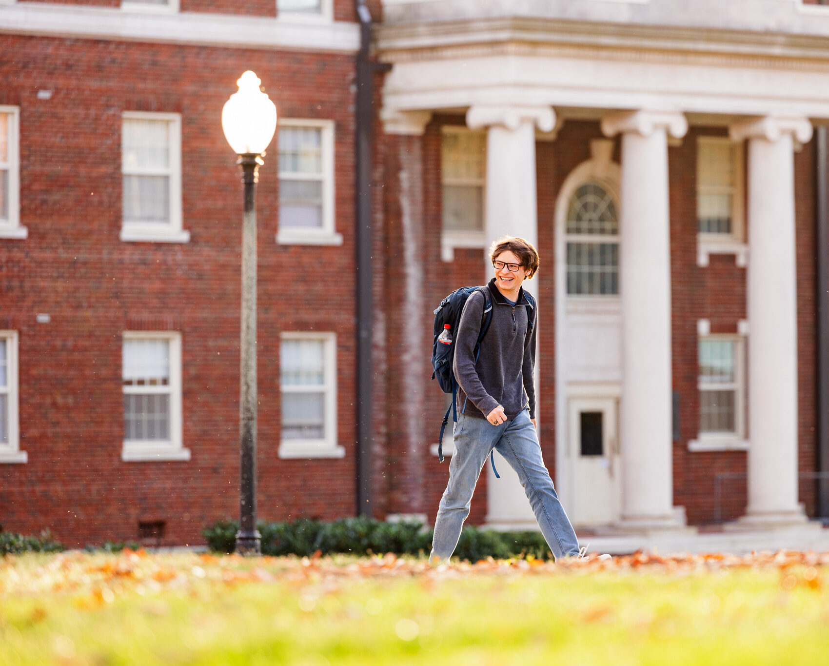 Student walking on Presbyterian College campus