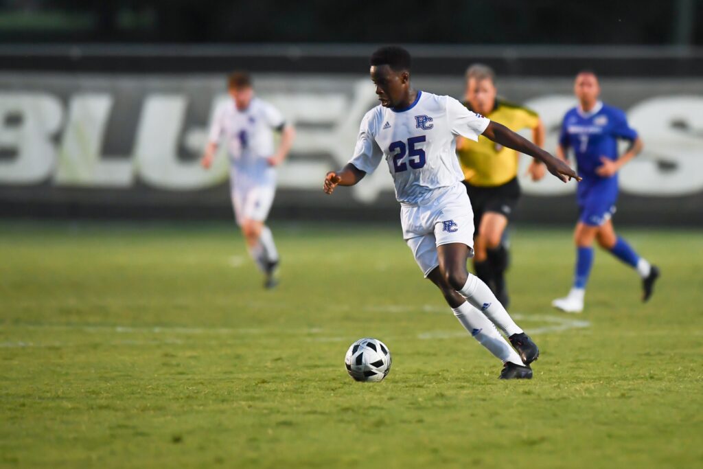 Men's soccer player in a game. 