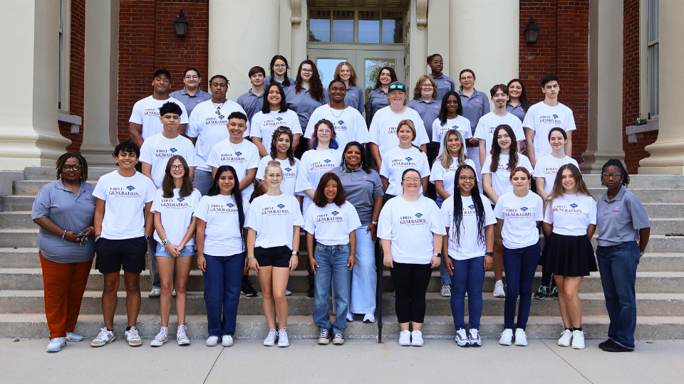Presbyterian College's new cohort of Presby First+ students and Jacobs Scholars with staff and peer mentors in front of historic Neville Hall.