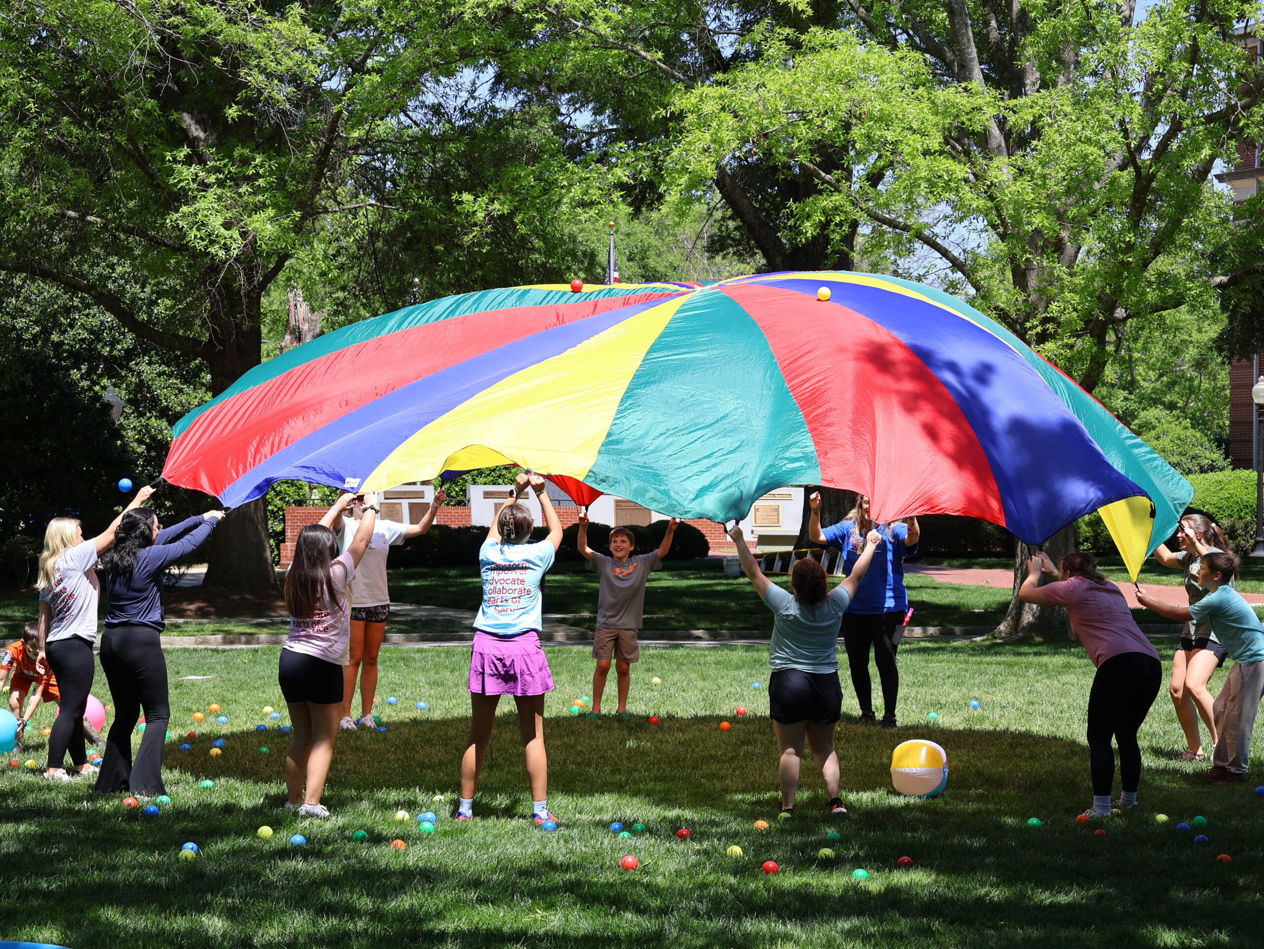 Kids playing with Occupational Therapy Doctoral Program students and Presbyterian College Education students.