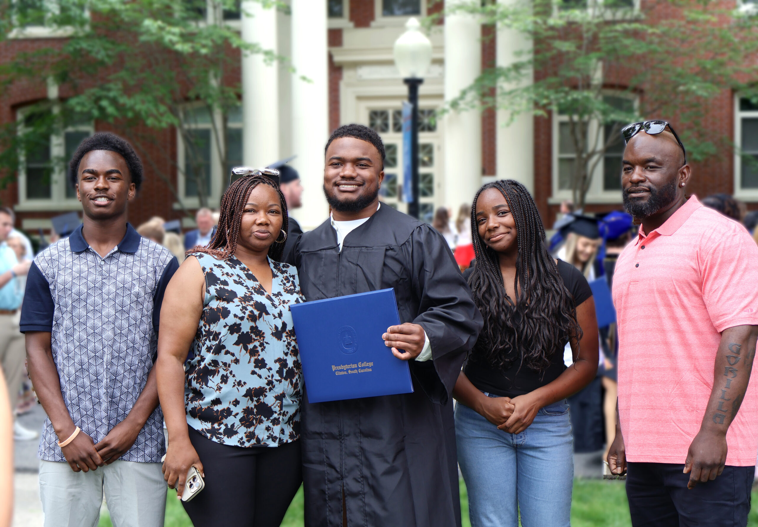 Presbyterian College graduate with his family after the ceremony.