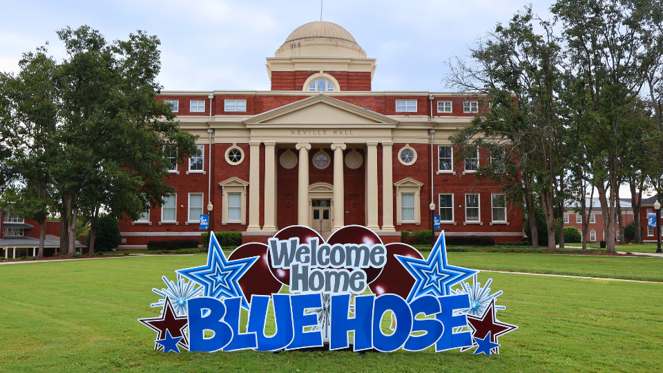 Welcome Home Blue Hose sign in front of Neville Hall at Presbyterian College