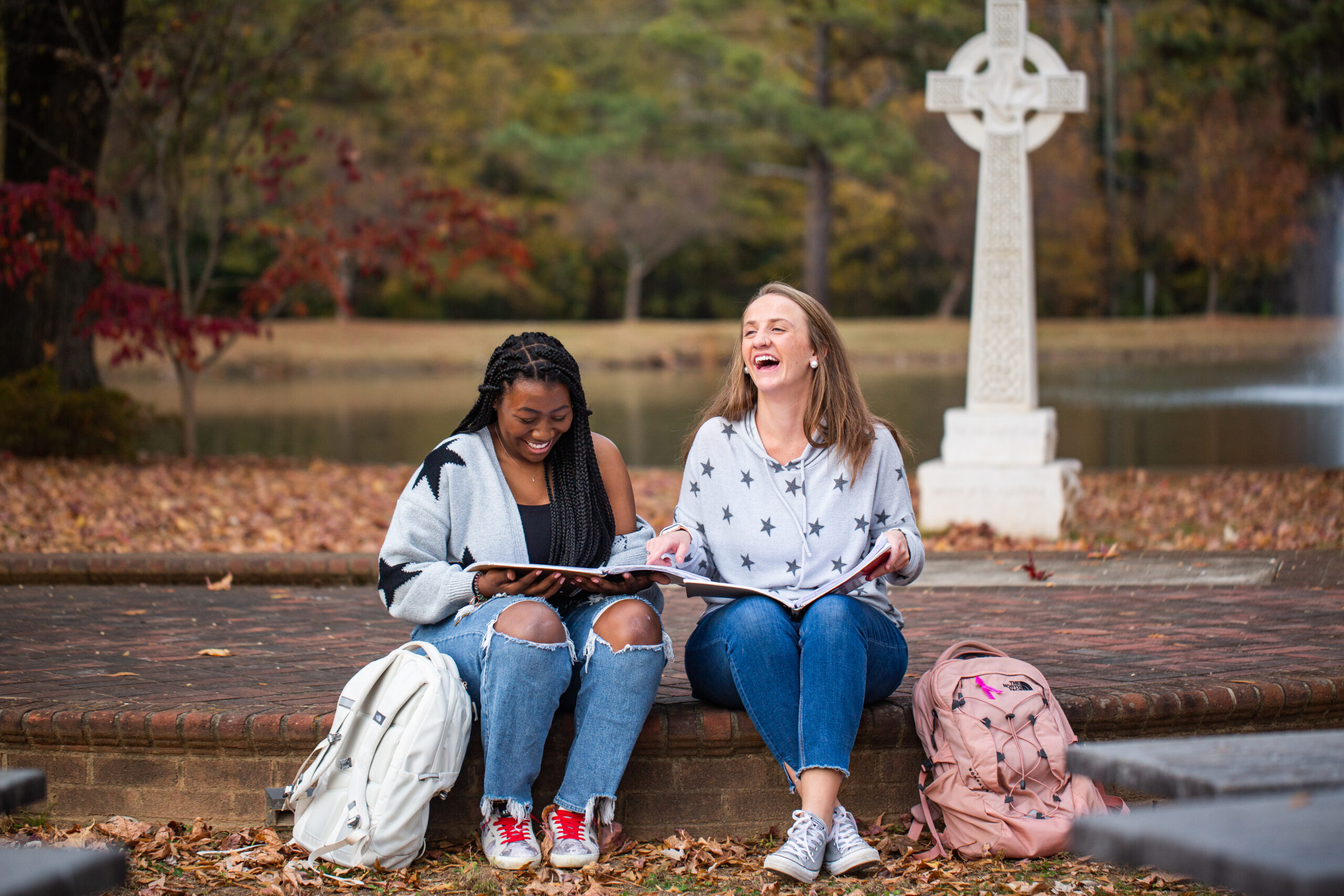 Students sitting at the Celtic Cross