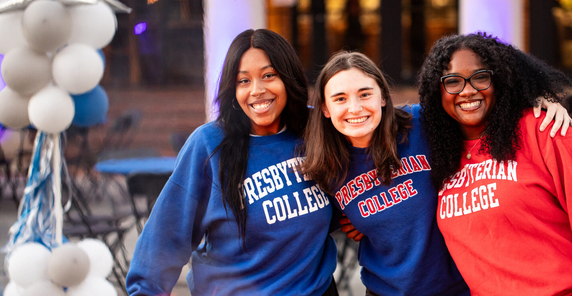 Three PC students at the Annual Friday night lawn party for Homecoming 2024