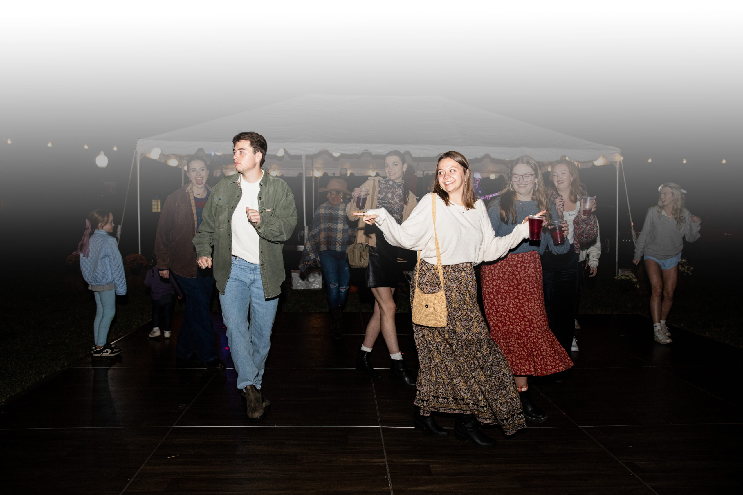 Alumni dancing at annual Homecoming Lawn Party at Presbyterian College.