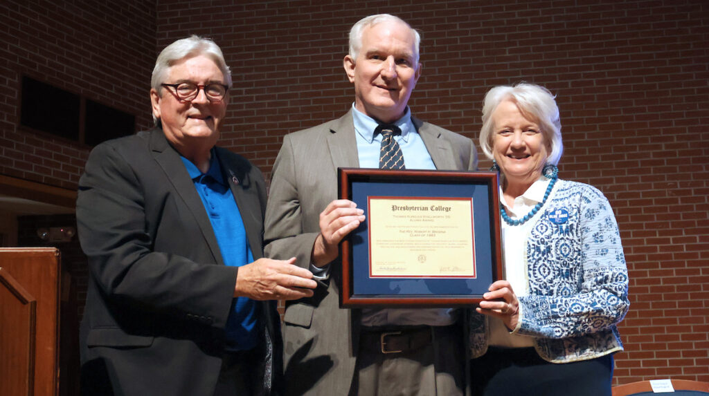 Thomas Aurelius Stallworth Award winner Rev. Bob Brozina '83 with Randy Randall '75, and Dr. Anita Gustafson.
