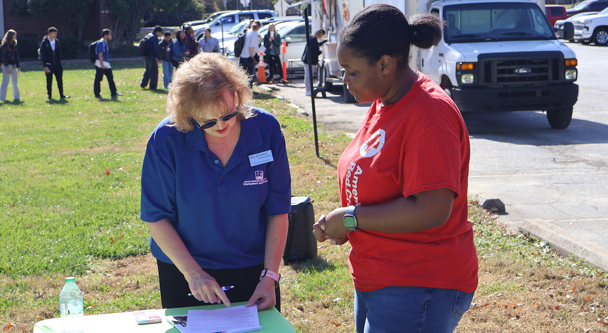 Presbyterian College student presenting her resume for review at the Career Festival on the Lawn.