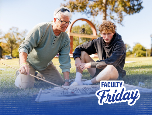 Presbyterian College art professor Ralph Paquin working with a student.