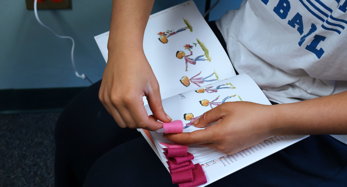 Presbyterian College special education majors held a book drive and modified books for students with exceptional needs.