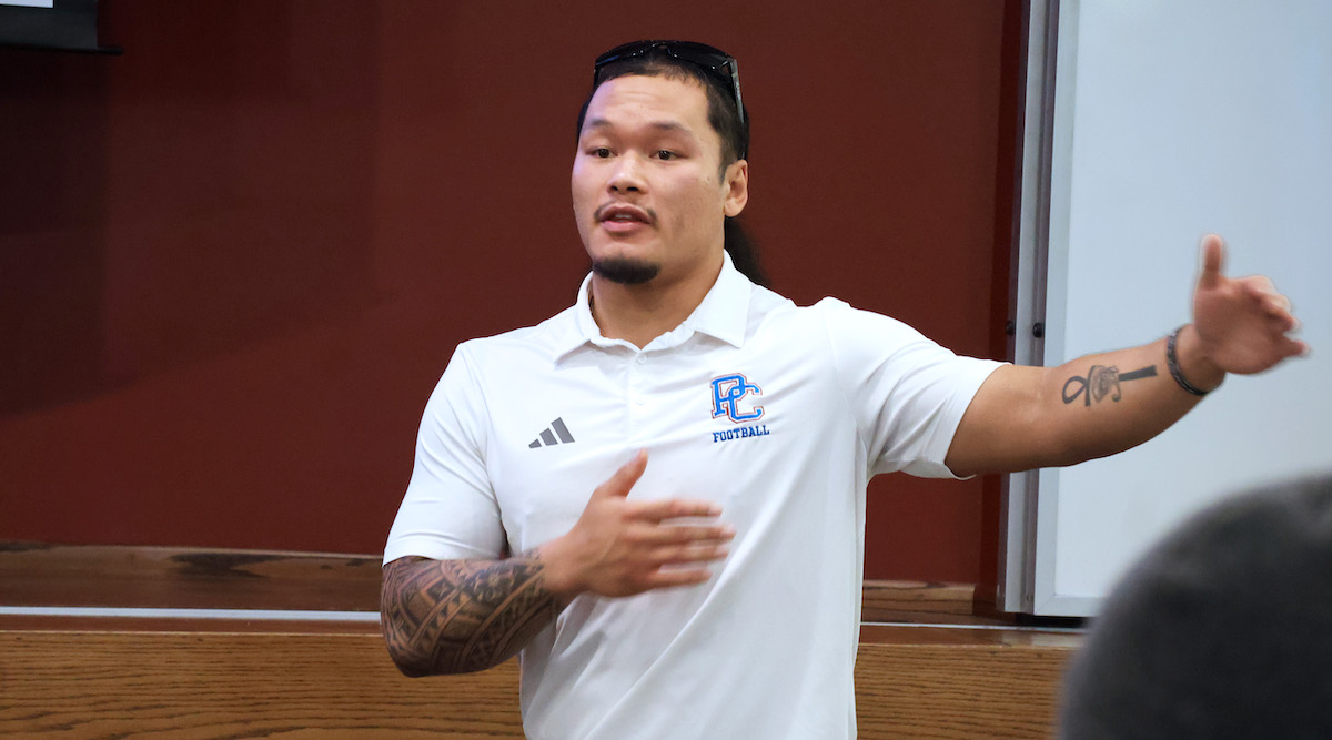 Psychology major Jason Briones presents his honors research before graduating in December, 2025.