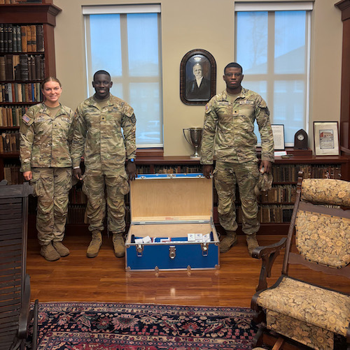 Members of the ROTC Highlander Battalion escort this year's class rings from the Founder's Library in Thomason Library to the PC ROTC Hall of Fame and to the ring ceremony in Edmunds Hall.