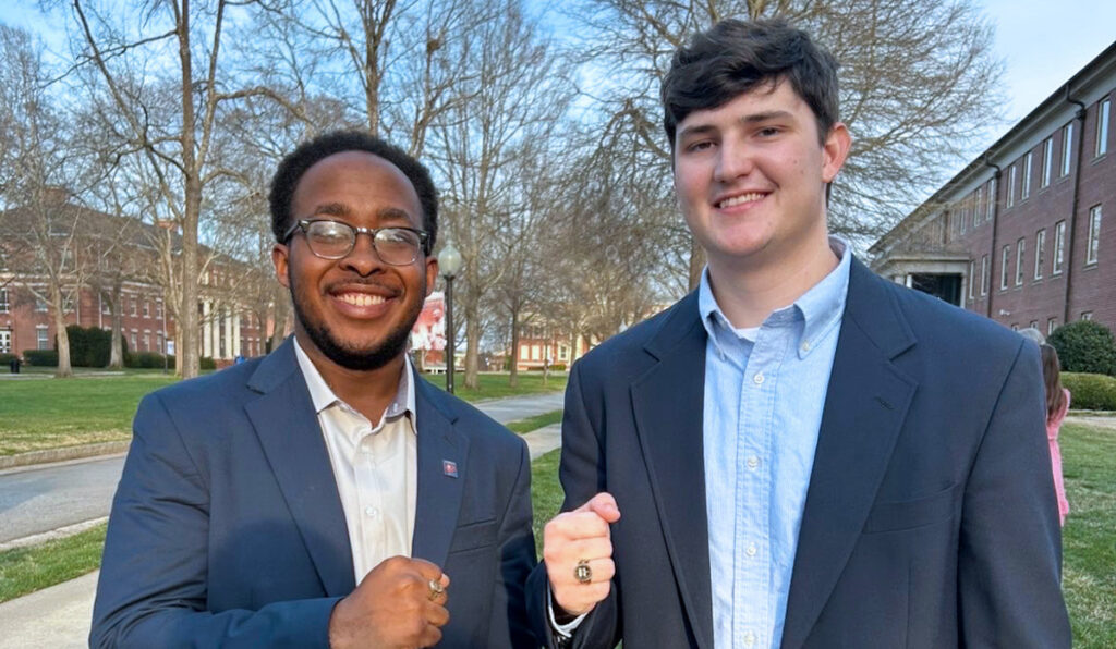 Two PC students reveal off their new class rings following this year's ring ceremony.