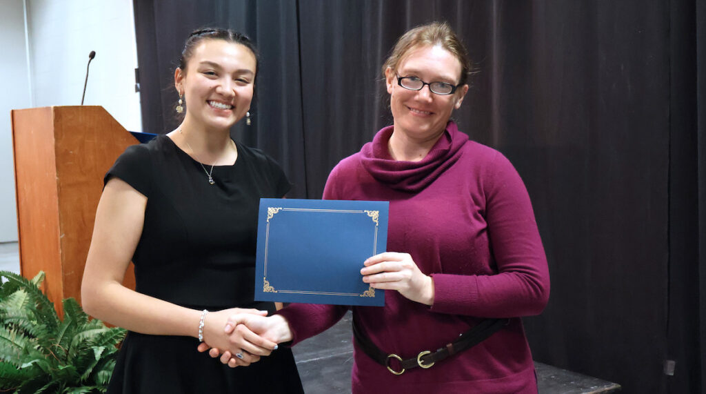 Presbyterian College senior Vanessa Palisin with her first place award at the Southeast Decision Sciences Institute annual conference in Jacksonville, Fla., with PC professor Dr. Rachel Childers.