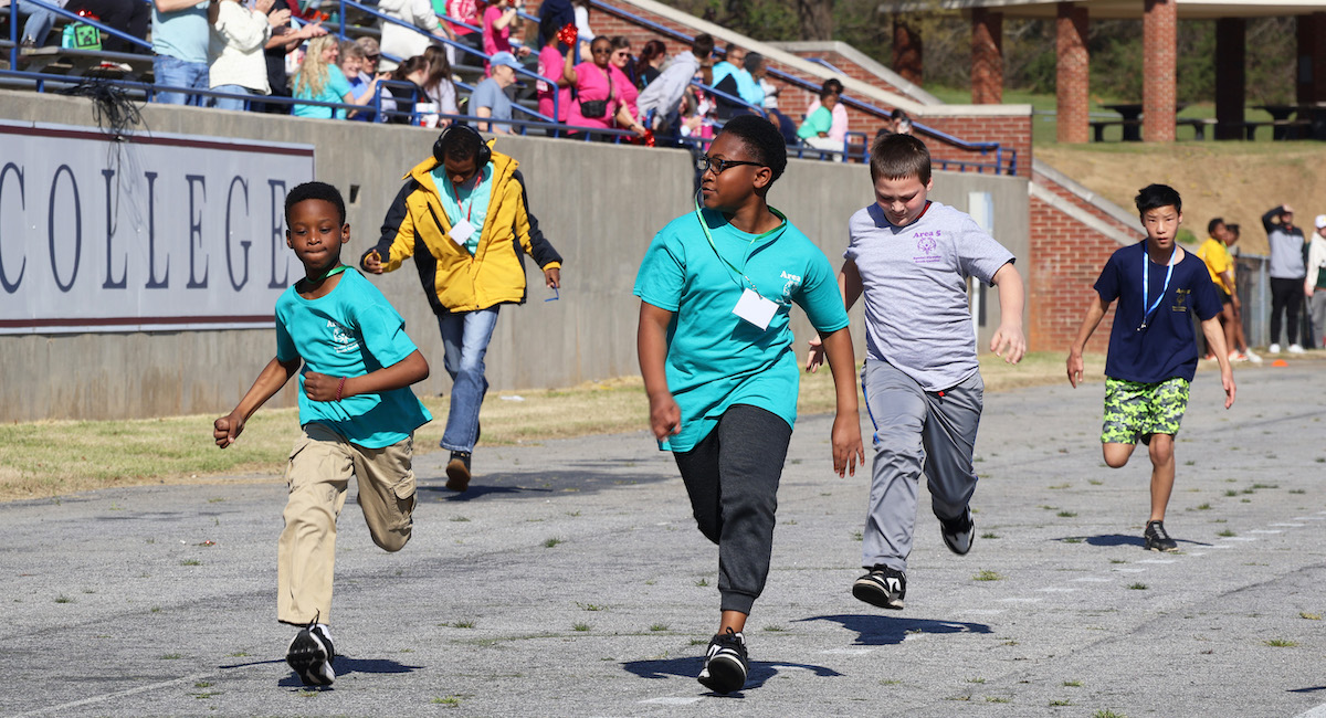 Special Olympians sprint on the track during the Special Olympics at Presbyterian College.