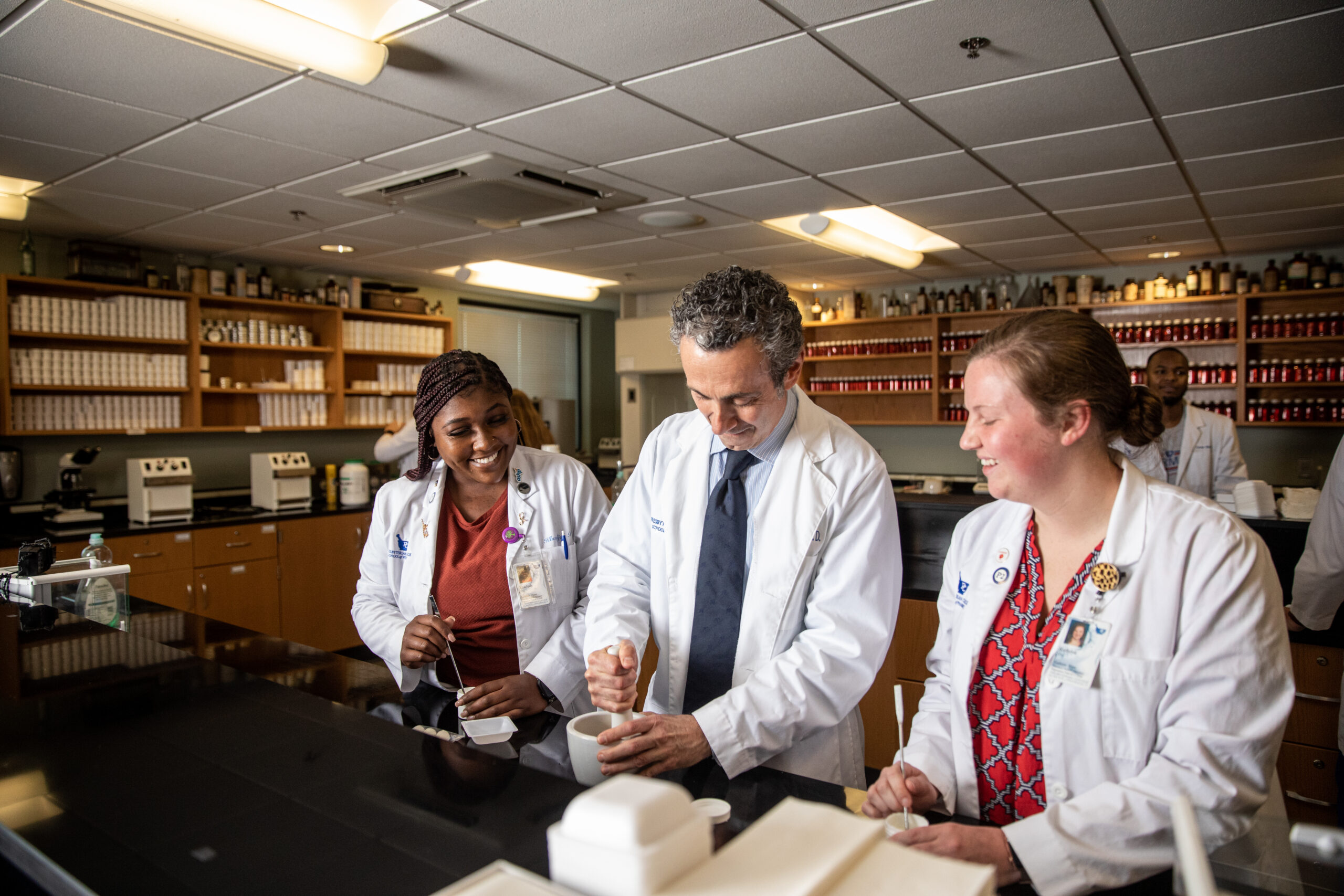 pharmacy students in classroom with professor