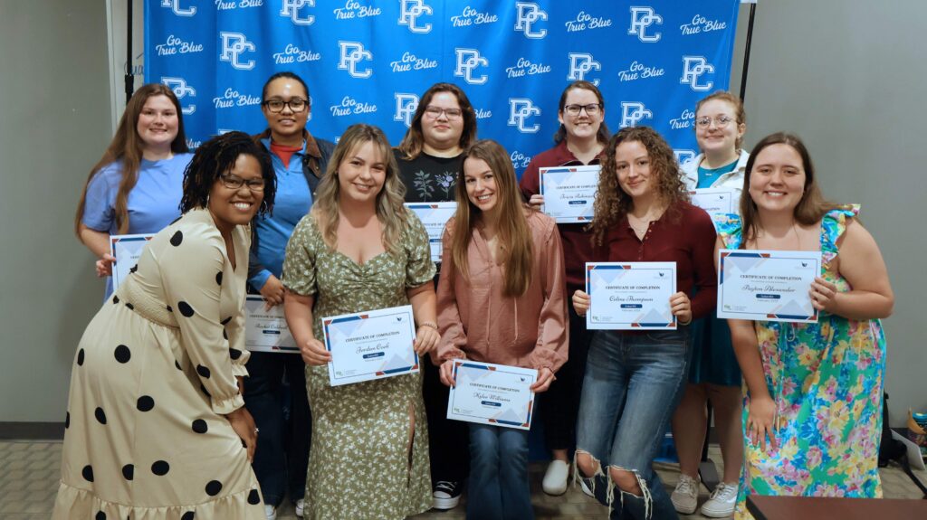 Pharmacy students pose with certificates at their Awards Day.
