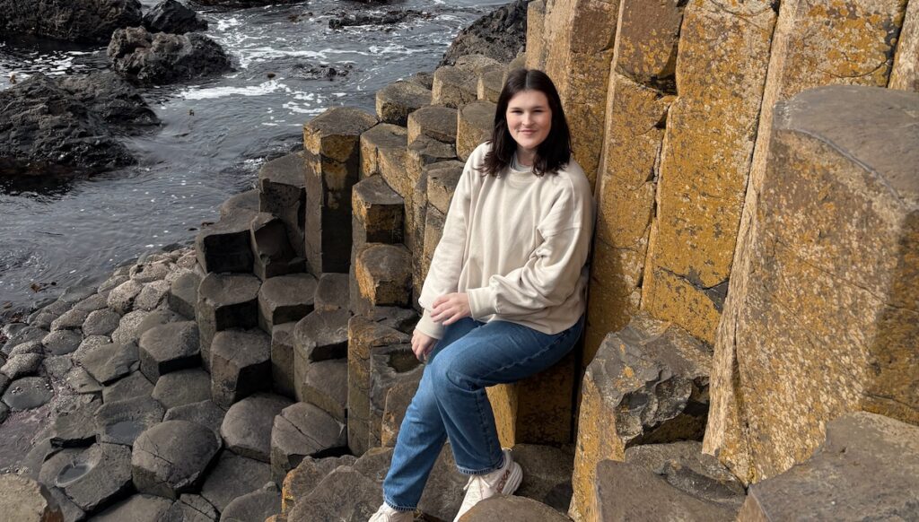Presbyterian College senior Madeyln Wilkie on on the coast of Ireland, part of her intercultural experiences doing research and study abroad.