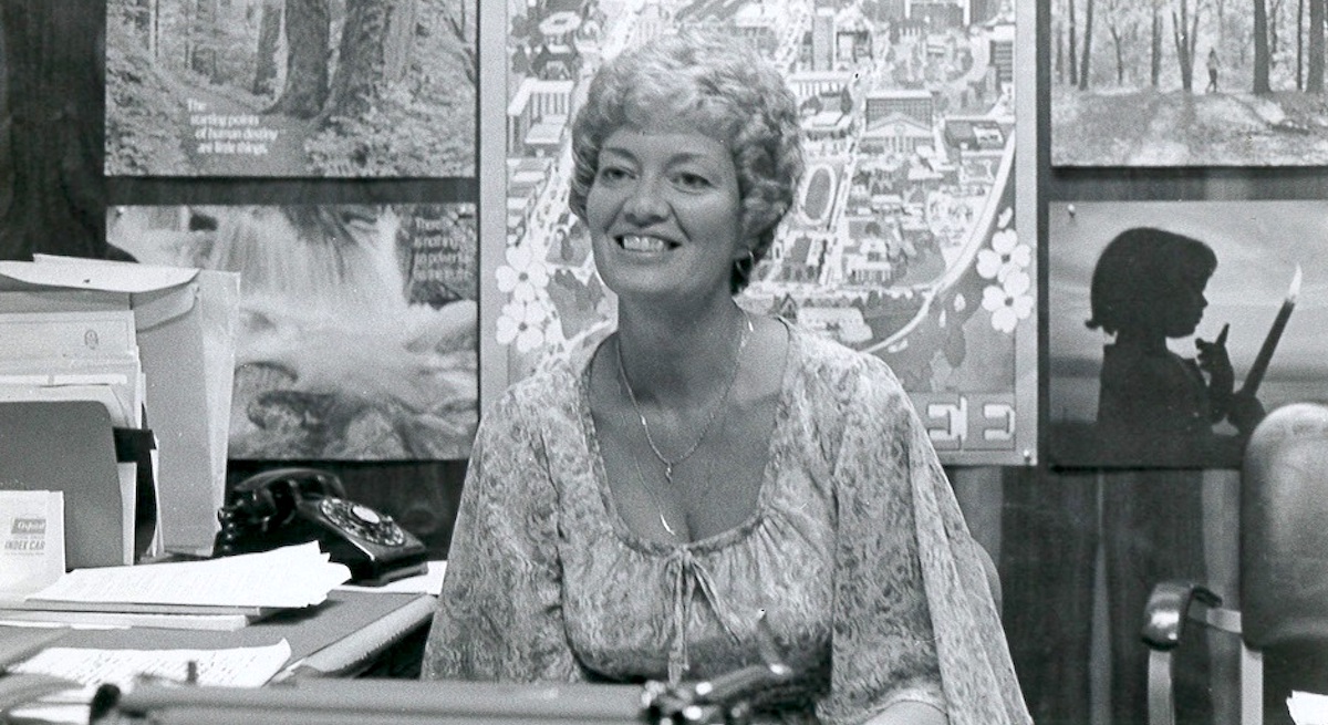 Black and white feature photo of professor emerita of psychology Dr. Ann Stidham in her office.