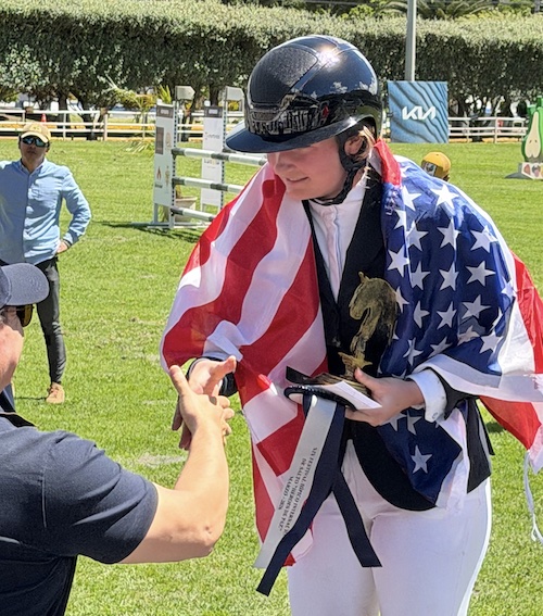 PC sophomore Lois Cooper claims first prize in her event at this year's Heroes of Peace equestrian competition in Equador.