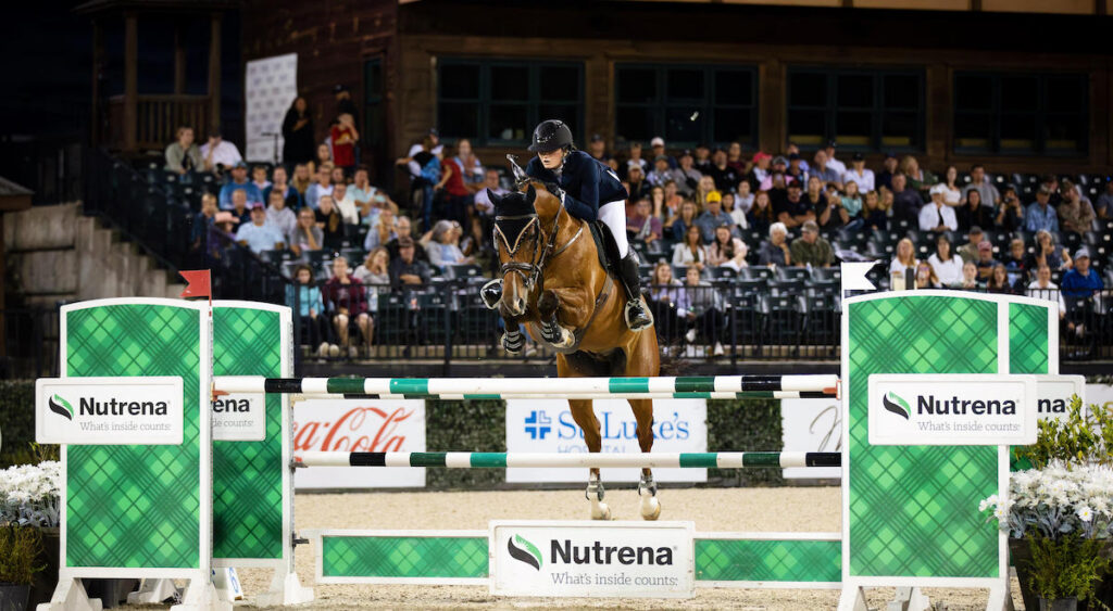 PC sophomore Lois Cooper on her horse Impala.