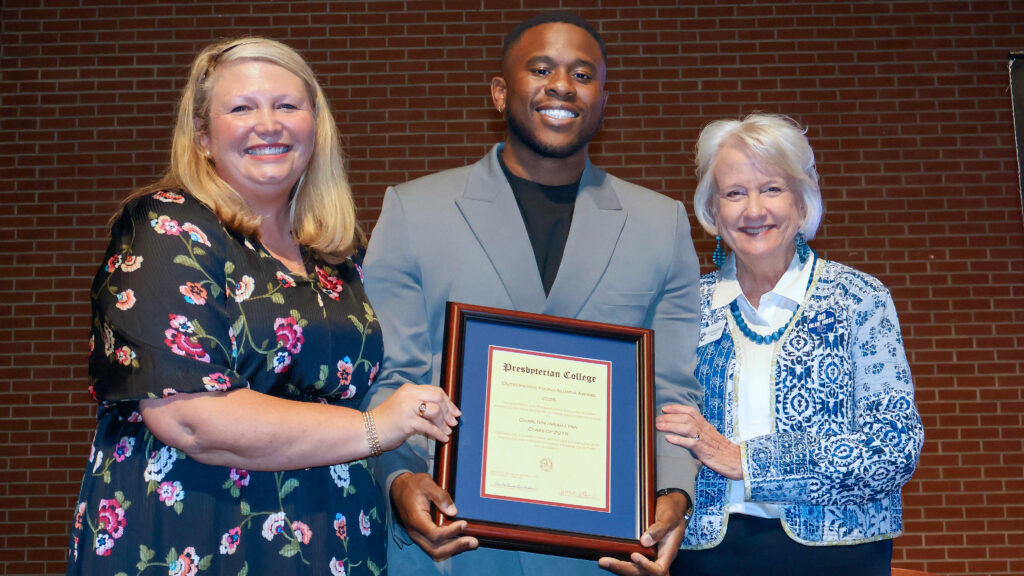 Outstanding Young Alumnus Isaiah Lynn '15 with Jessica Jetton '99, and PC president Dr. Anita Gustafson.