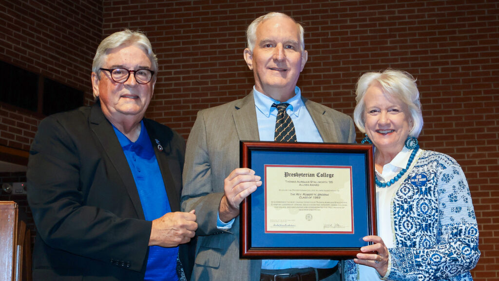 Thomas Aurelius Stallworth Award winner Rev. Bob Brozina '83 with Randy Randall '75, and Dr. Anita Gustafson.
