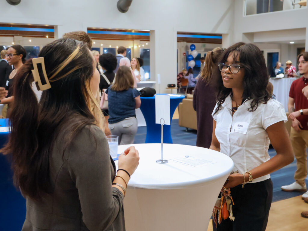 PC students and alumni networking at Mocktails & Mingling.
