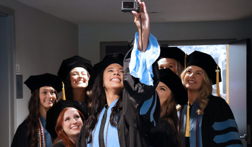 Members of the fourth cohort of Occupational Therapy Doctoral program gather for selfies before their hooding ceremony on May 2 and are now going into the world to transform lives.