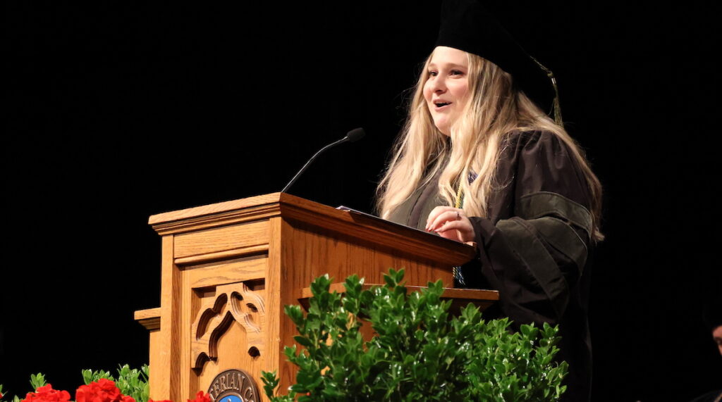 Mackenzie Chapman '26 addresses her classmates during the 2026 hooding ceremony for the PC School of Pharmacy