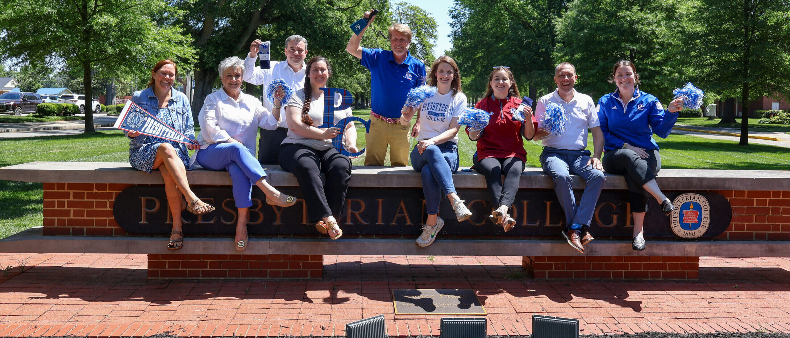Advancement team posing for photo at the Presbyterian College sign on Giving Day 2026