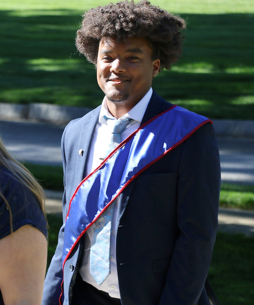 Rising senior Jaden Holder as a junior marshal for the 2026 commencement ceremonies.