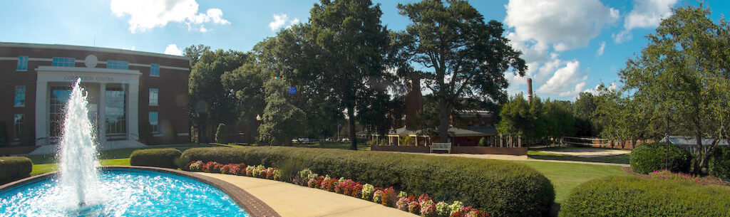 Campus shot of central Campbell Plaza including Cornelson Center, fountain, and Springs Student Center.