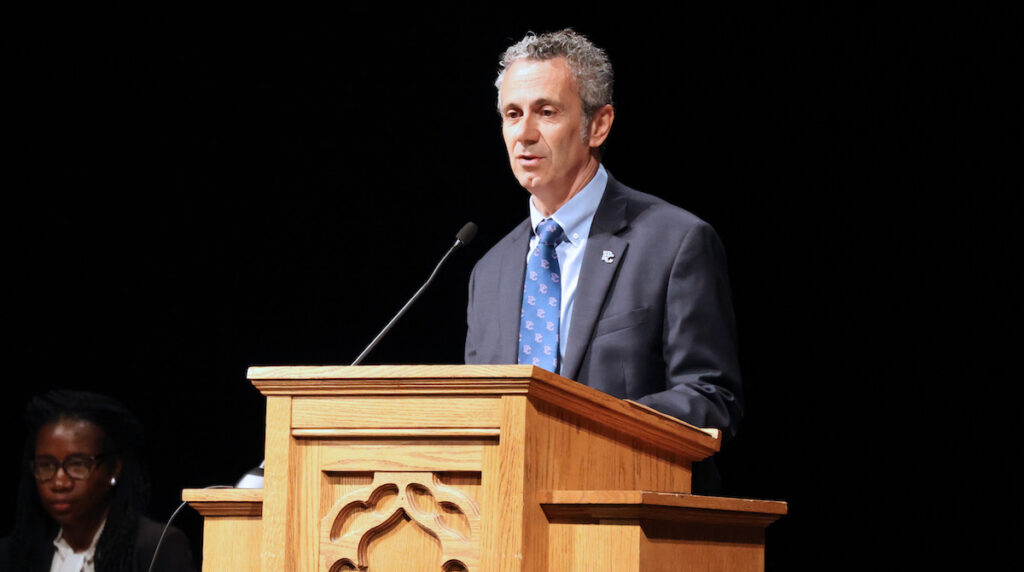 Dr. Giuseppe Gumina, dean of the PC School of Pharmacy, speaking at the 2026 White Coat Ceremony.