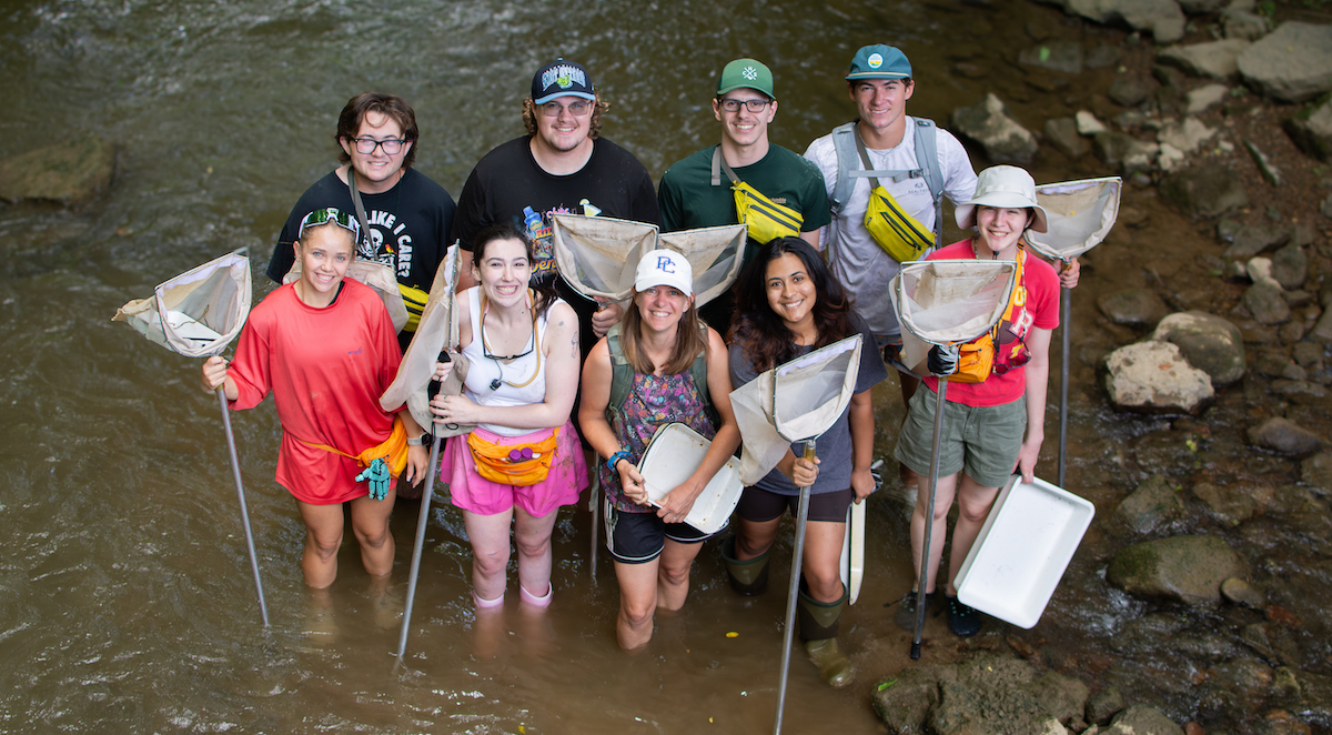 PC students with assistant professor of biology Dr. Sabrina Moore on the Clinch River in Tennessee.