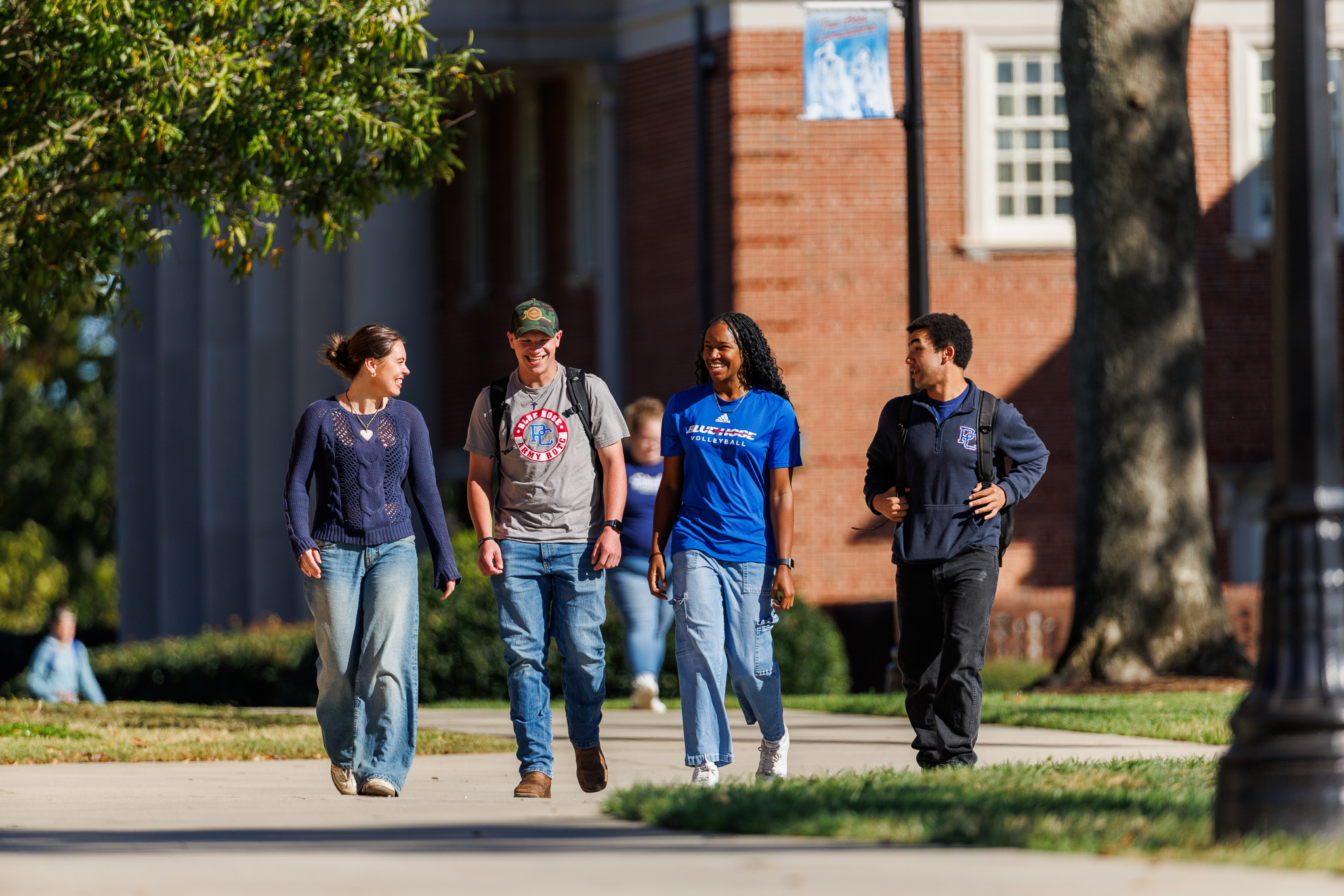 Students walking and smiling at Presbyterian College
