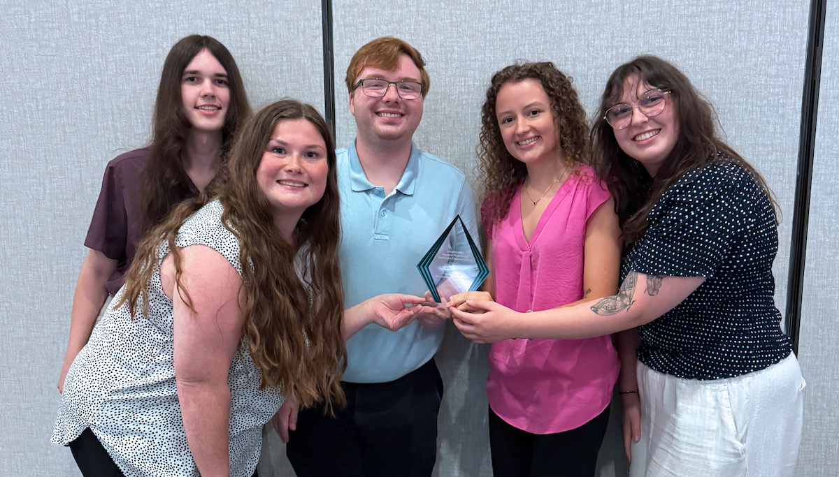 The PC School of Pharmacy Self Care Bowl winners show off their trophy during the S.C. Pharmacy Association's annual meeting in Charleston.