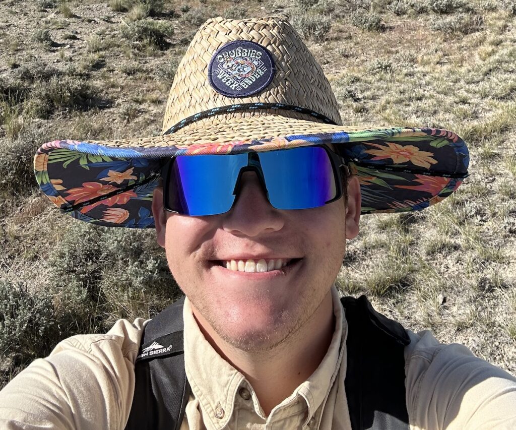 PC student Jeremiah Stichnoth in the field during his summer out west digging for dinosaur fossils.