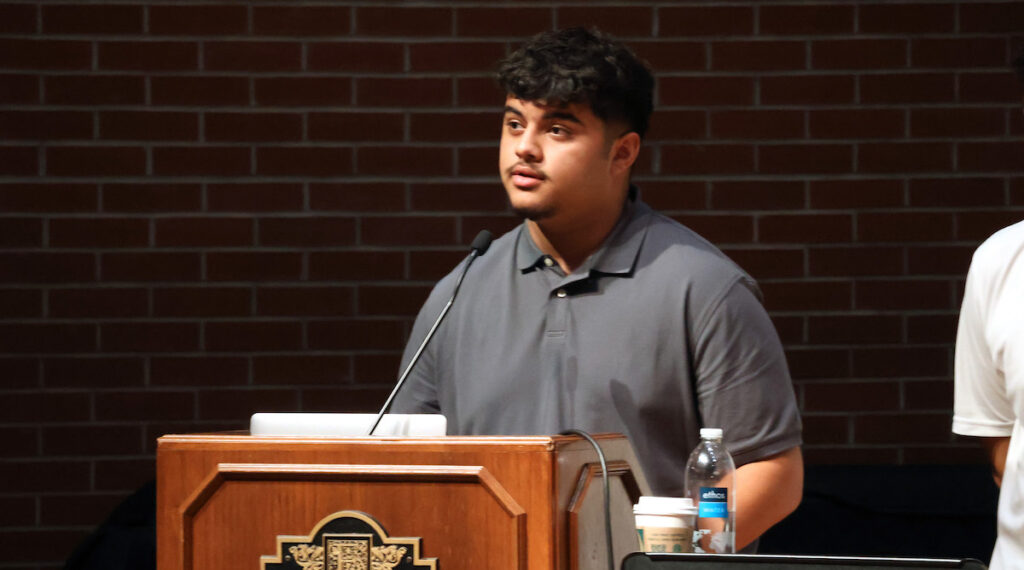 Alex Melgar '27 speaks at a Hispanic Heritage Month event.